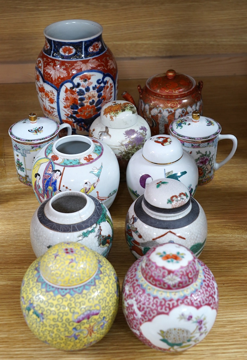 A quantity of Chinese and Japanese ceramics including Kutani, Imari, famille rose etc. tallest 22cm. Condition - fair to good